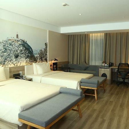 เอทัวร์ โฮเต็ล หนานถง จงเฉิง Hotel หนานทง ภายนอก รูปภาพ