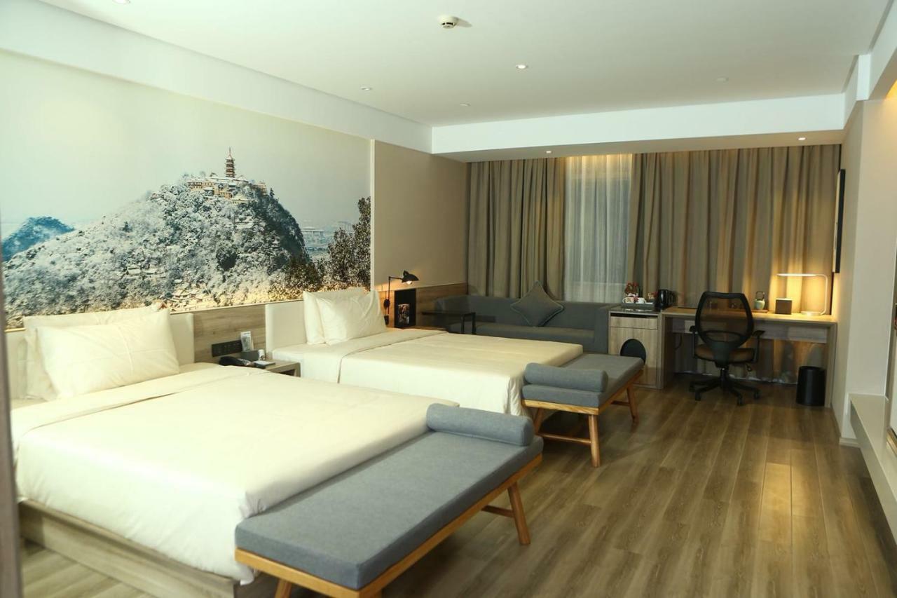 เอทัวร์ โฮเต็ล หนานถง จงเฉิง Hotel หนานทง ภายนอก รูปภาพ